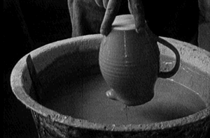 The Leach Pottery - Dipping an Urn